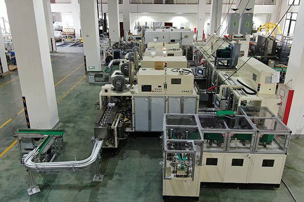 Integrated Stackers and Baggers for Sanitary Napkins, Pantyliners